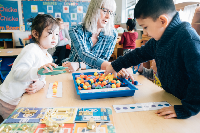 Teacher working with preschool children
